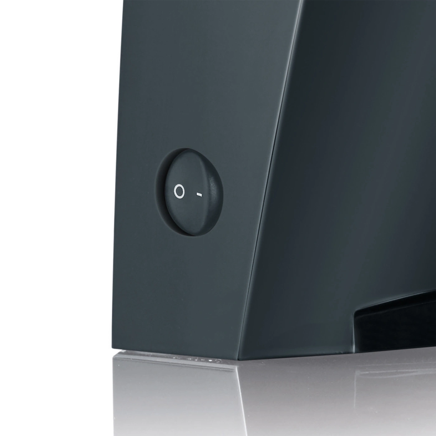 Gray device with on-off switch, detail shot, close-up, technology, product design