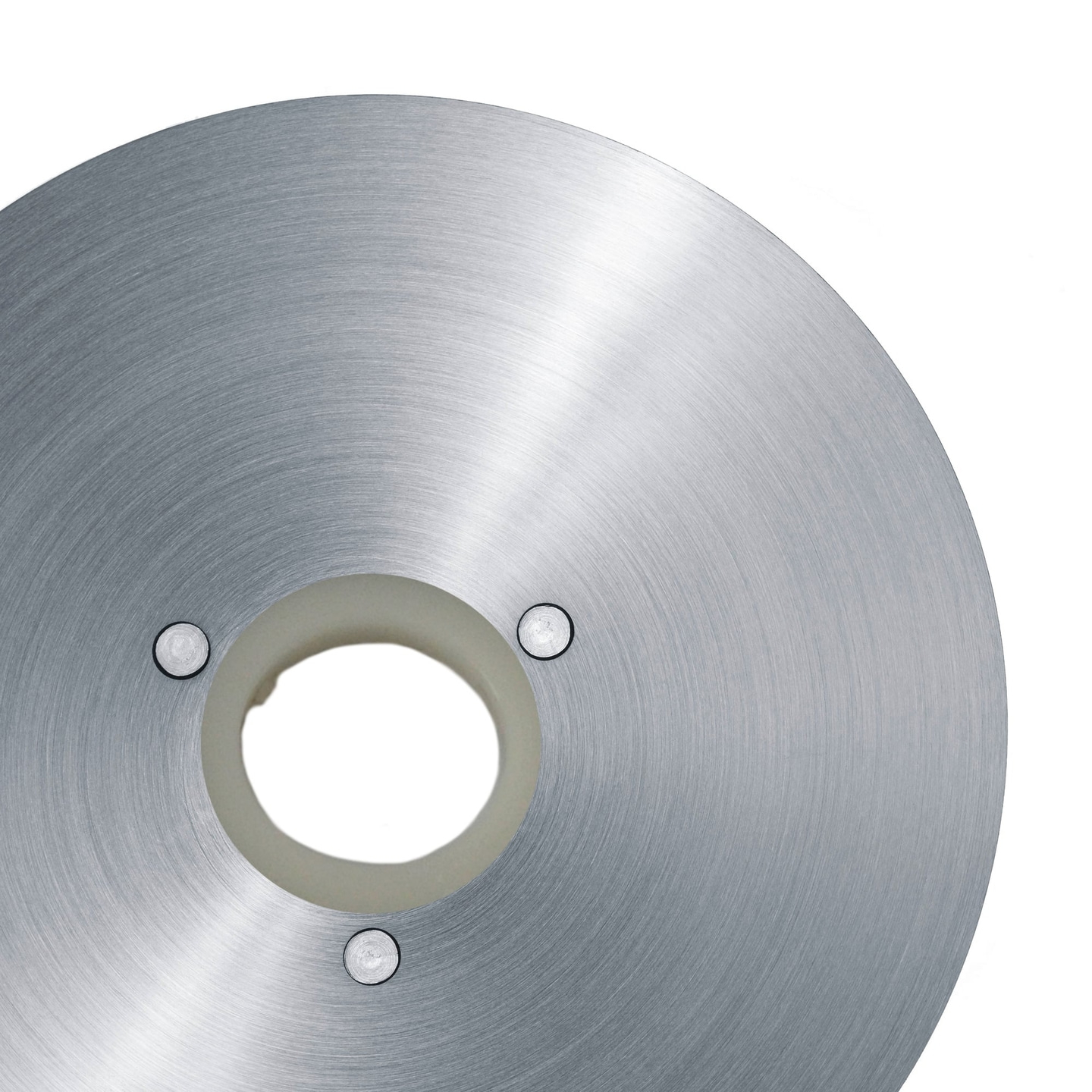 Circular metal part with screws and a hole in the middle, isolated on white