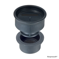 Black coffee machine attachment, separated, for capsules, with Nespresso logo.