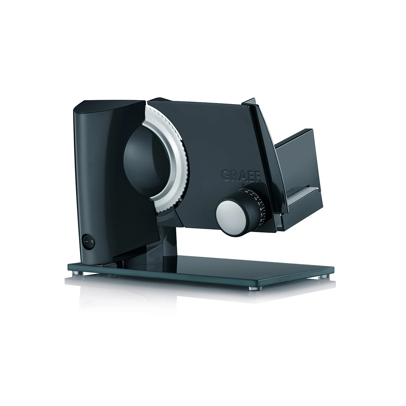 Black slicer with silver details and glass plate. Features the Graef logo.