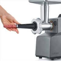 Meat grinder with sausage, hand, meat, machine, GRAEF, close-up, detail, gray