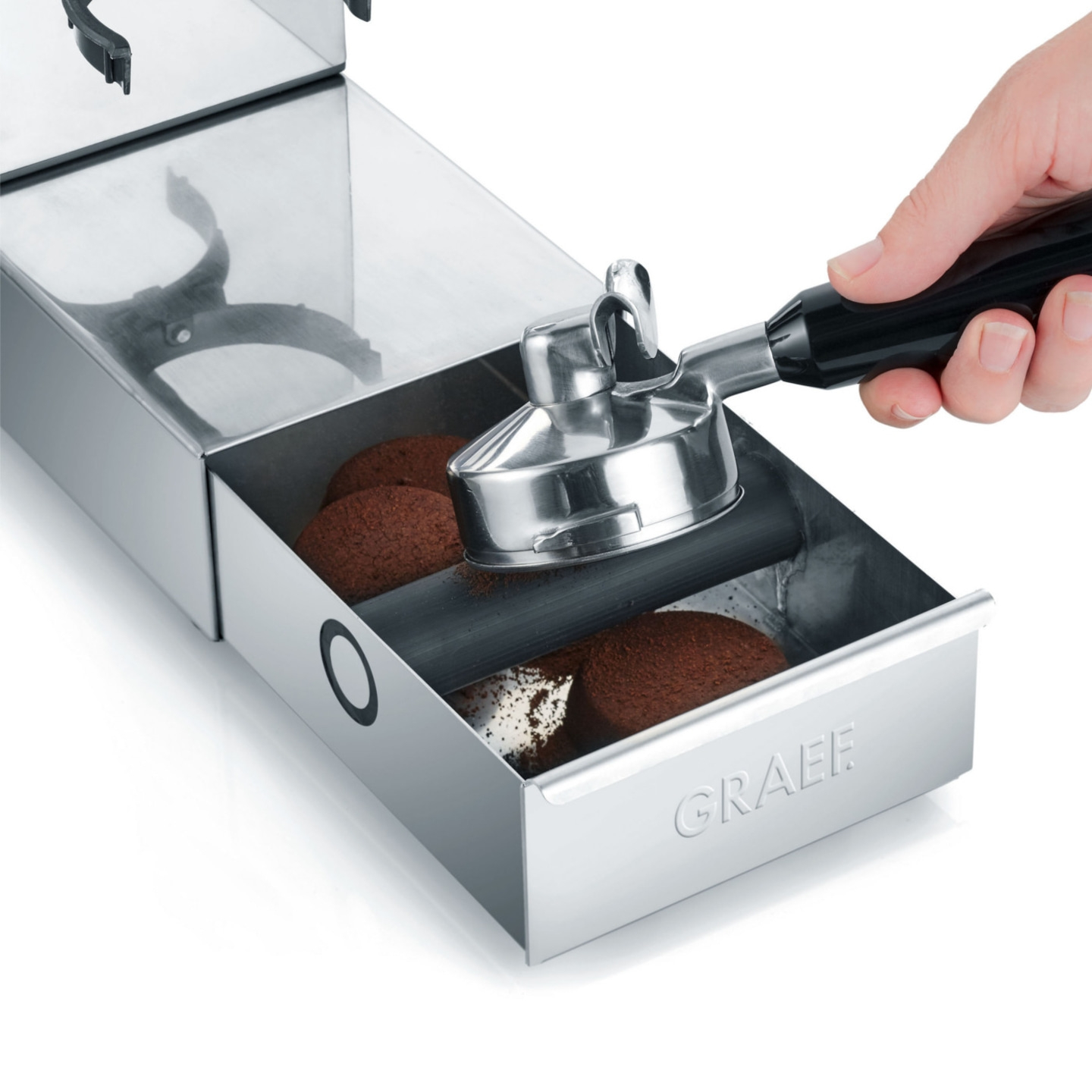 Macchina da caffè con cassetto e mano che tiene un portafiltro, logo GRAEF