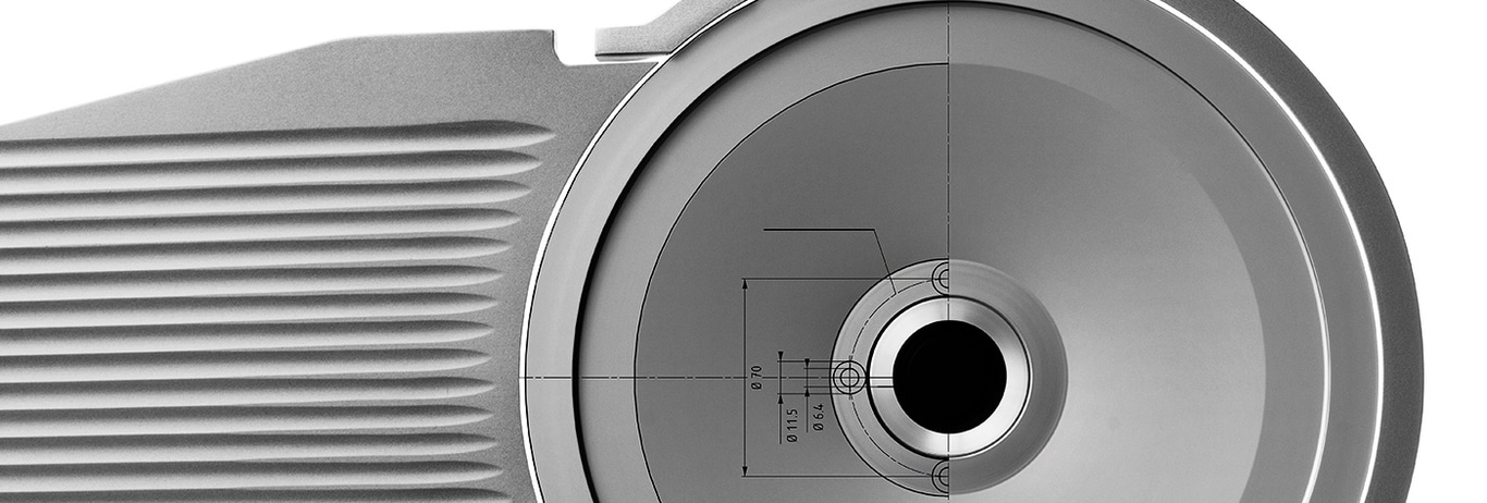 Close-up of a gray machine with technical drawings and detailed features