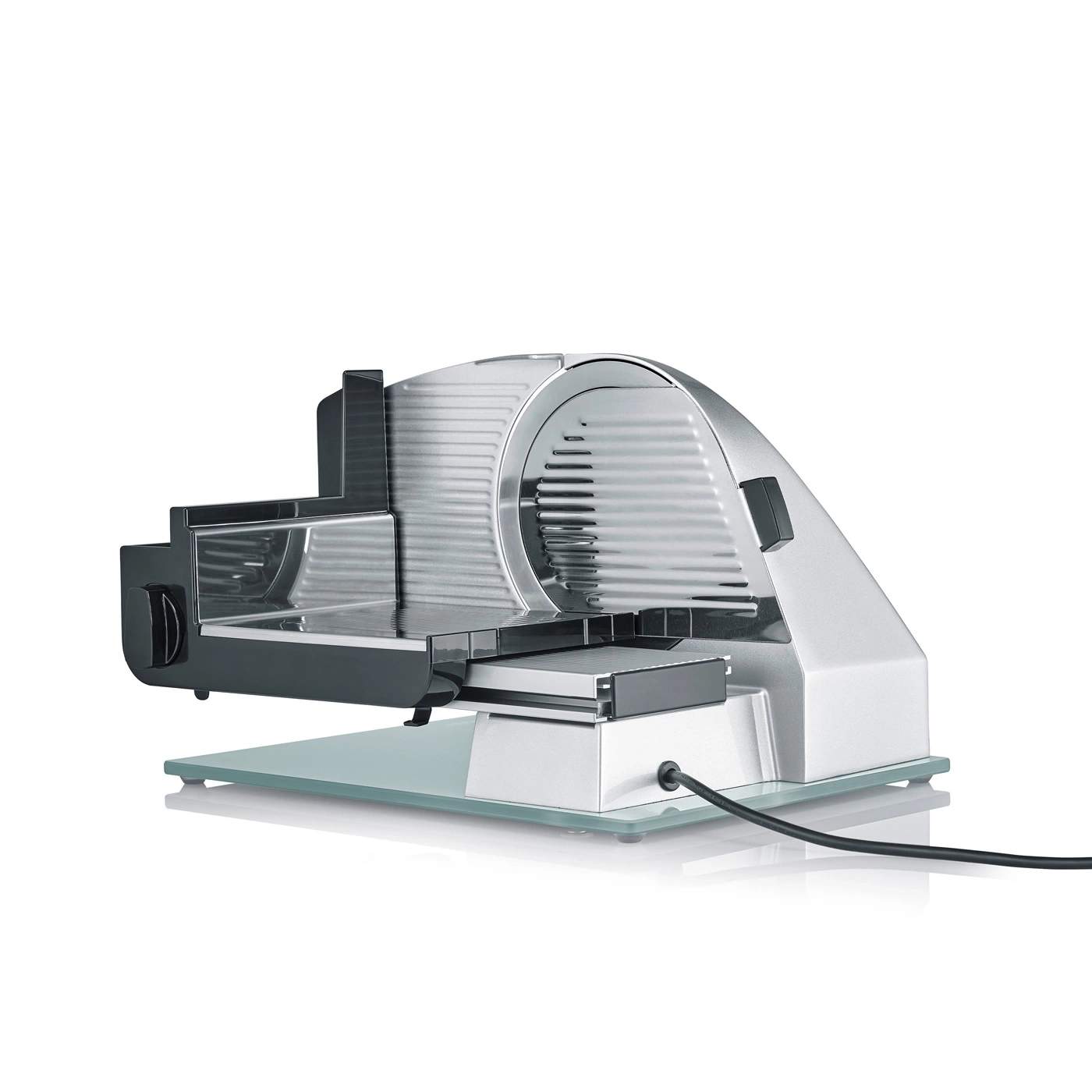 Electric food slicer, silver, with glass base and power cord, isolated on white