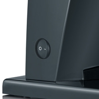 Appareil noir avec interrupteur marche/arrêt, gros plan, prise de détail, appareil