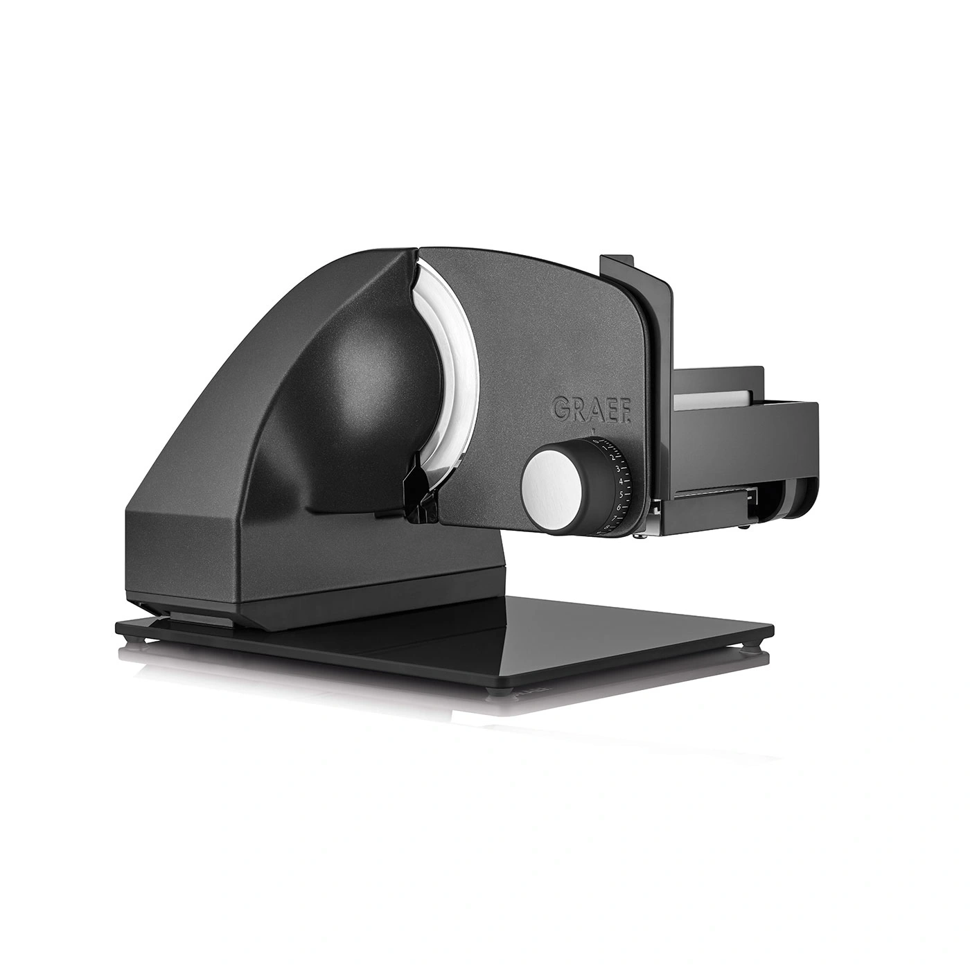Black electric slicer with silver accents and the brand name GRAEF on the side.