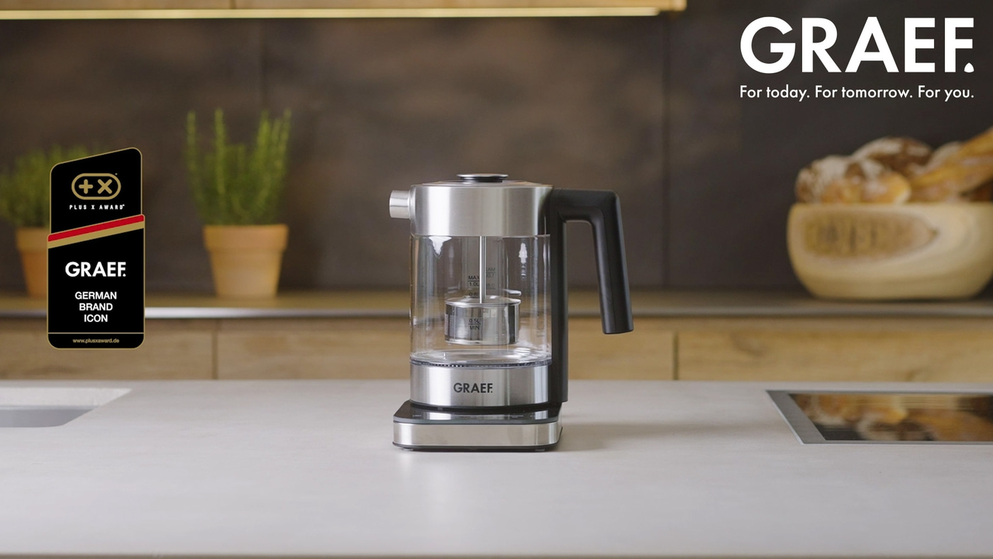 GRAEF kettle with logo and award on a kitchen countertop, modern design.