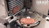 Salami being sliced by a machine. Graef logo. For today, for tomorrow, for you.