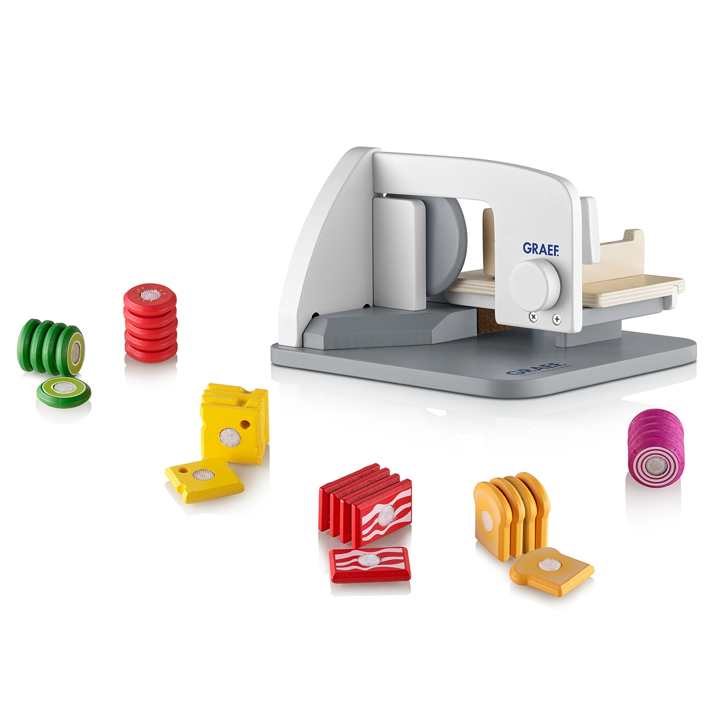 Toy bread slicer with toy food, wooden toy, GRAEF logo, white background, kitchen toy