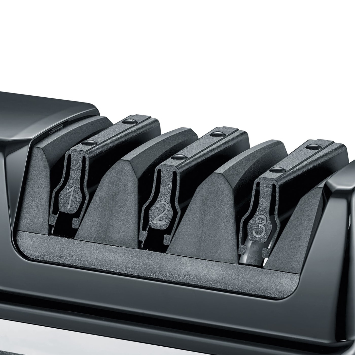 Knife sharpener with three numbered slots for sharpening knives, black plastic.