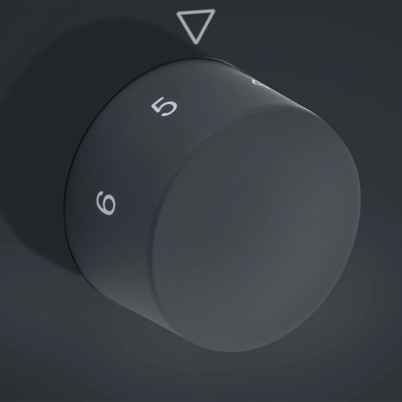 Rotary knob with numbers 5 and 6, dark background, triangle mark, gray