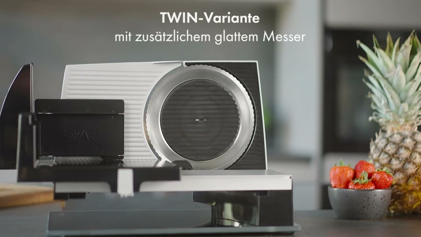 Trancheuse Graef avec ananas et fraises. Variante TWIN avec couteau lisse.