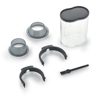 Disassembled kitchen machine with container, lid, brush, and accessories.