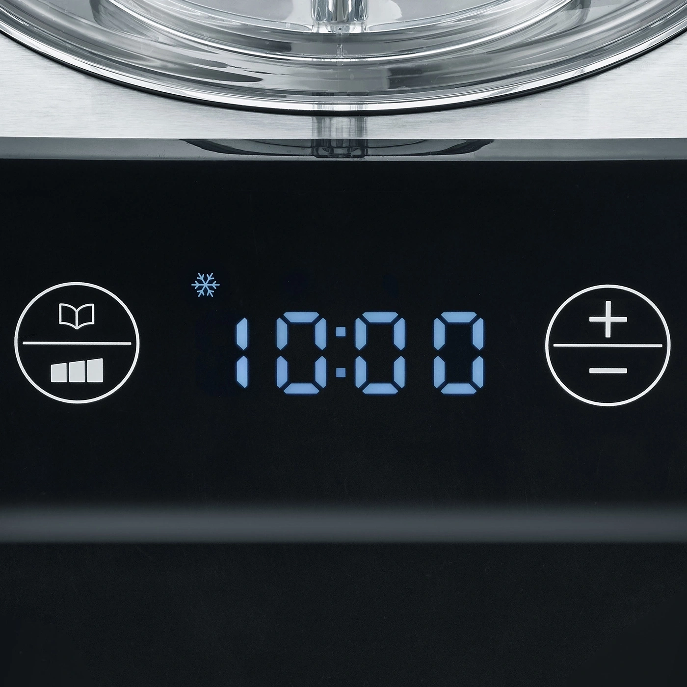 Close-up of control panel showing time 10:00 and various symbols