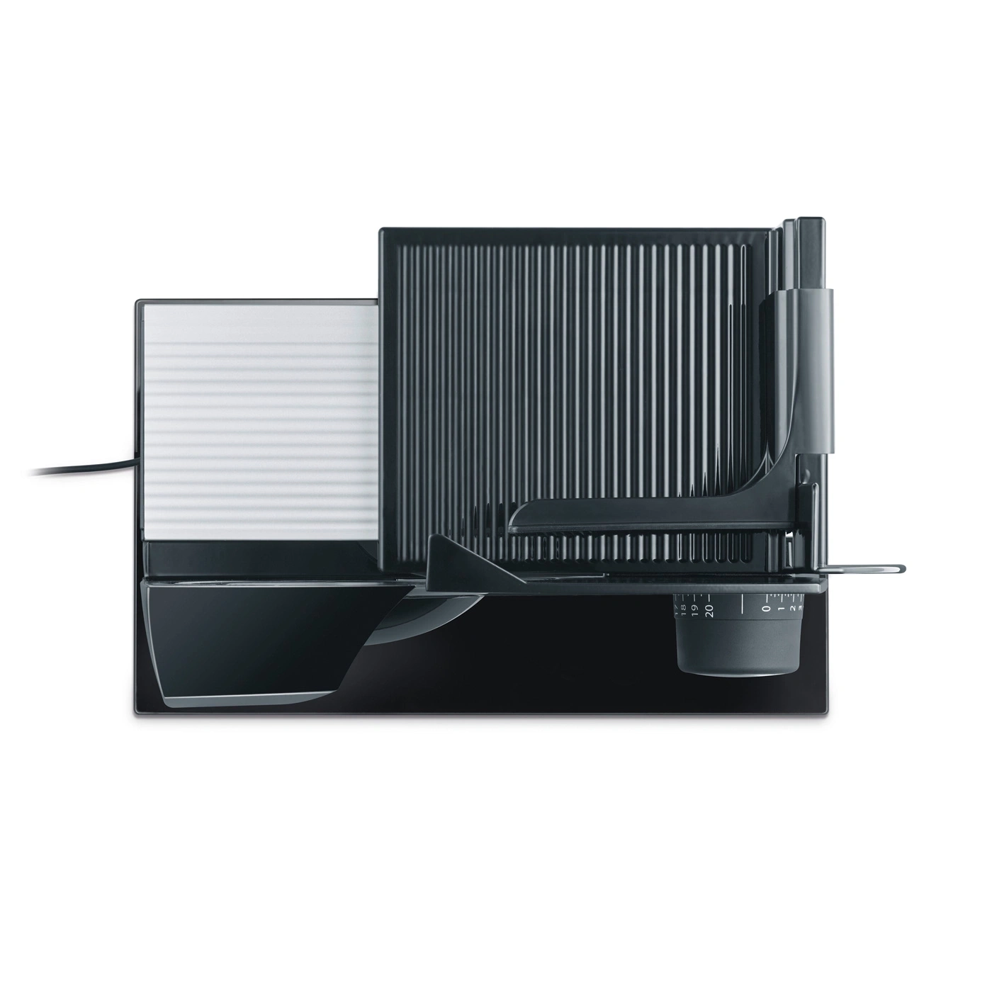Black electric food slicer with ribbed surface and adjustment dial for thickness.
