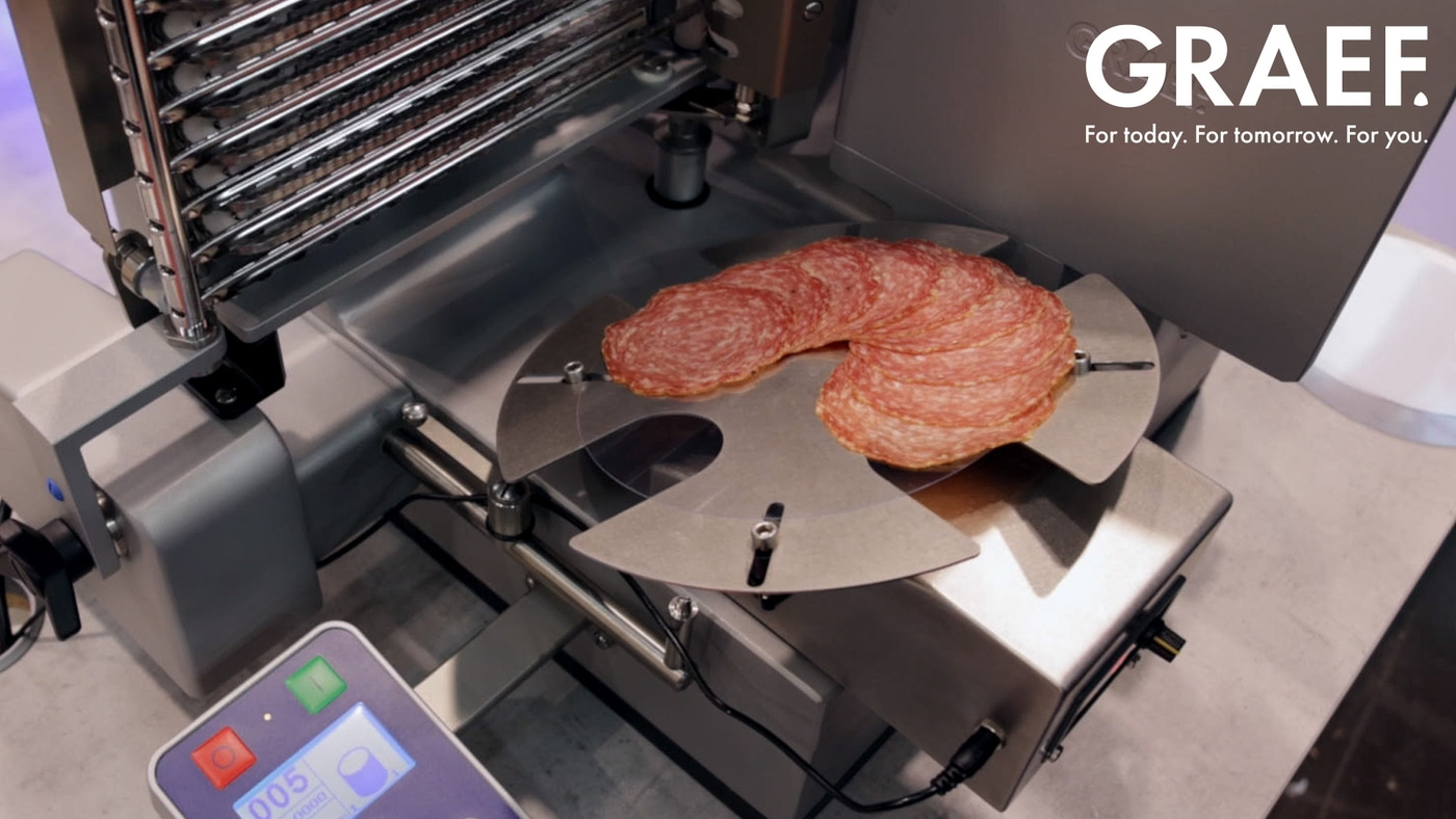 Salami slicer machine with GRAEF logo, for today and tomorrow's use.