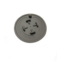 Disque gris avec texte 'DISC FOR CLEANING CAPSULE' et 'THIS SIDE UP'.