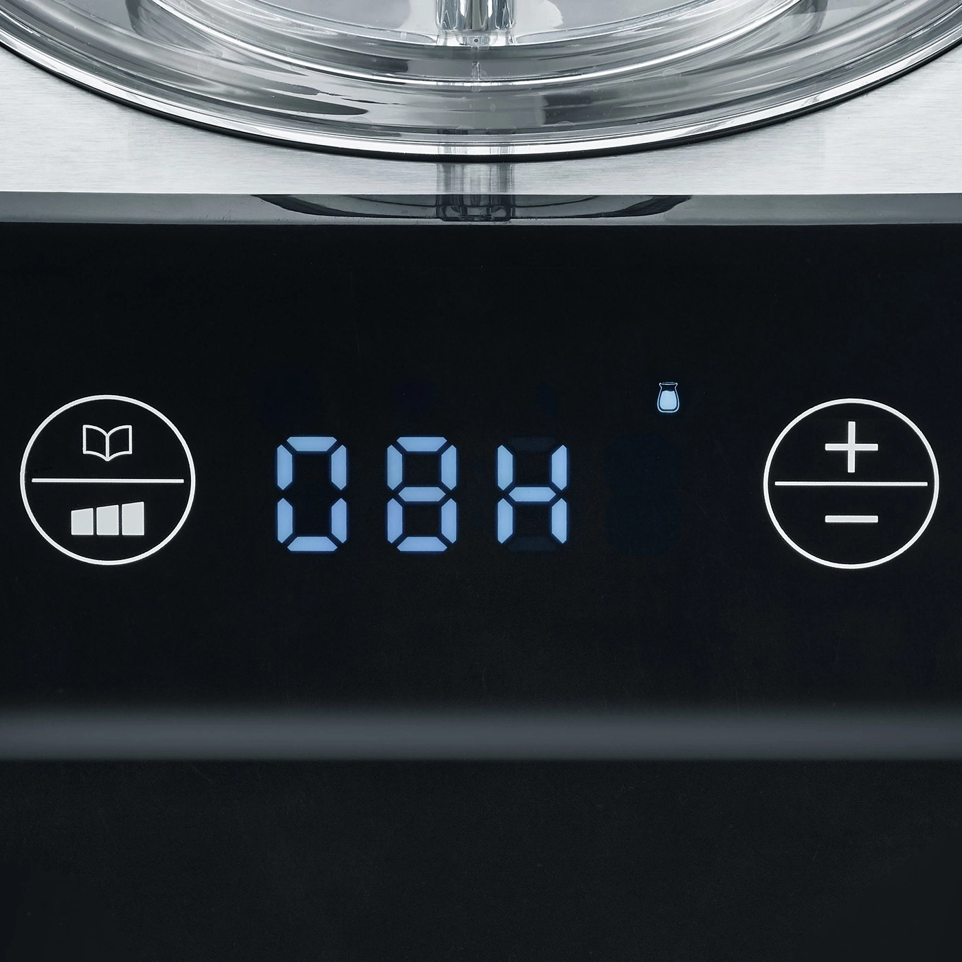 Close-up of control panel with display and symbols for operation and settings.
