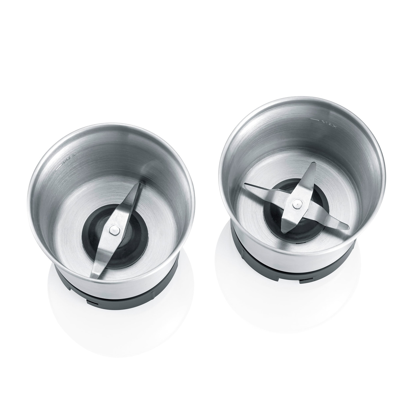 Two silver coffee grinders with blades on white background, close-up shot.
