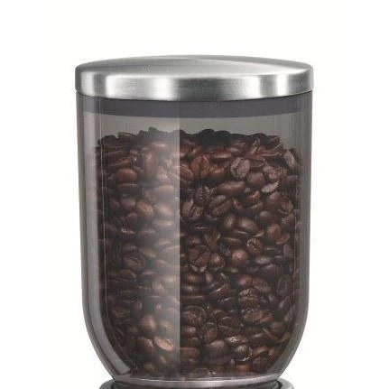 Grains de café dans un récipient en verre avec couvercle, gros plan, isolé
