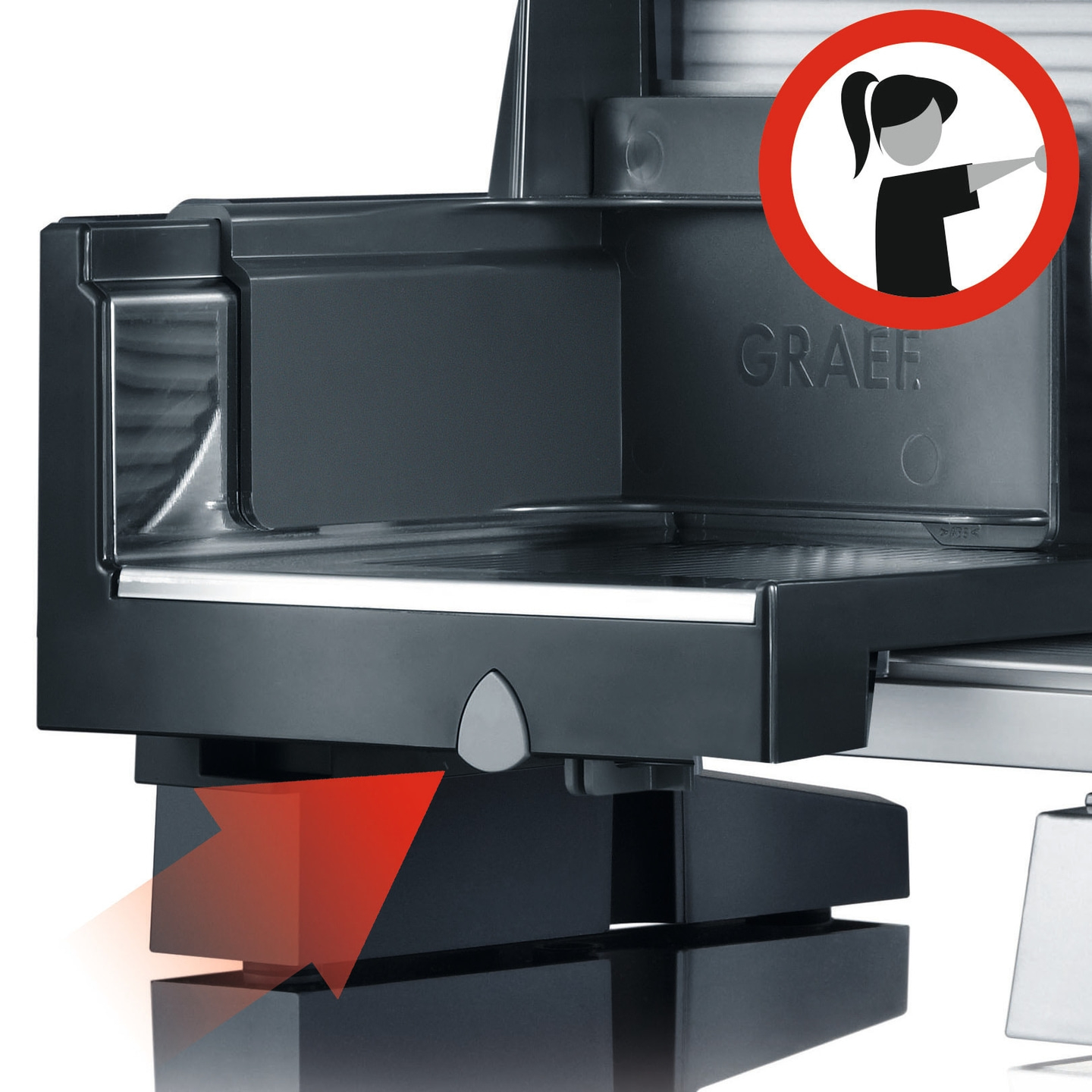 Affettatrice Graef con freccia rossa e simbolo di avvertimento di sicurezza.