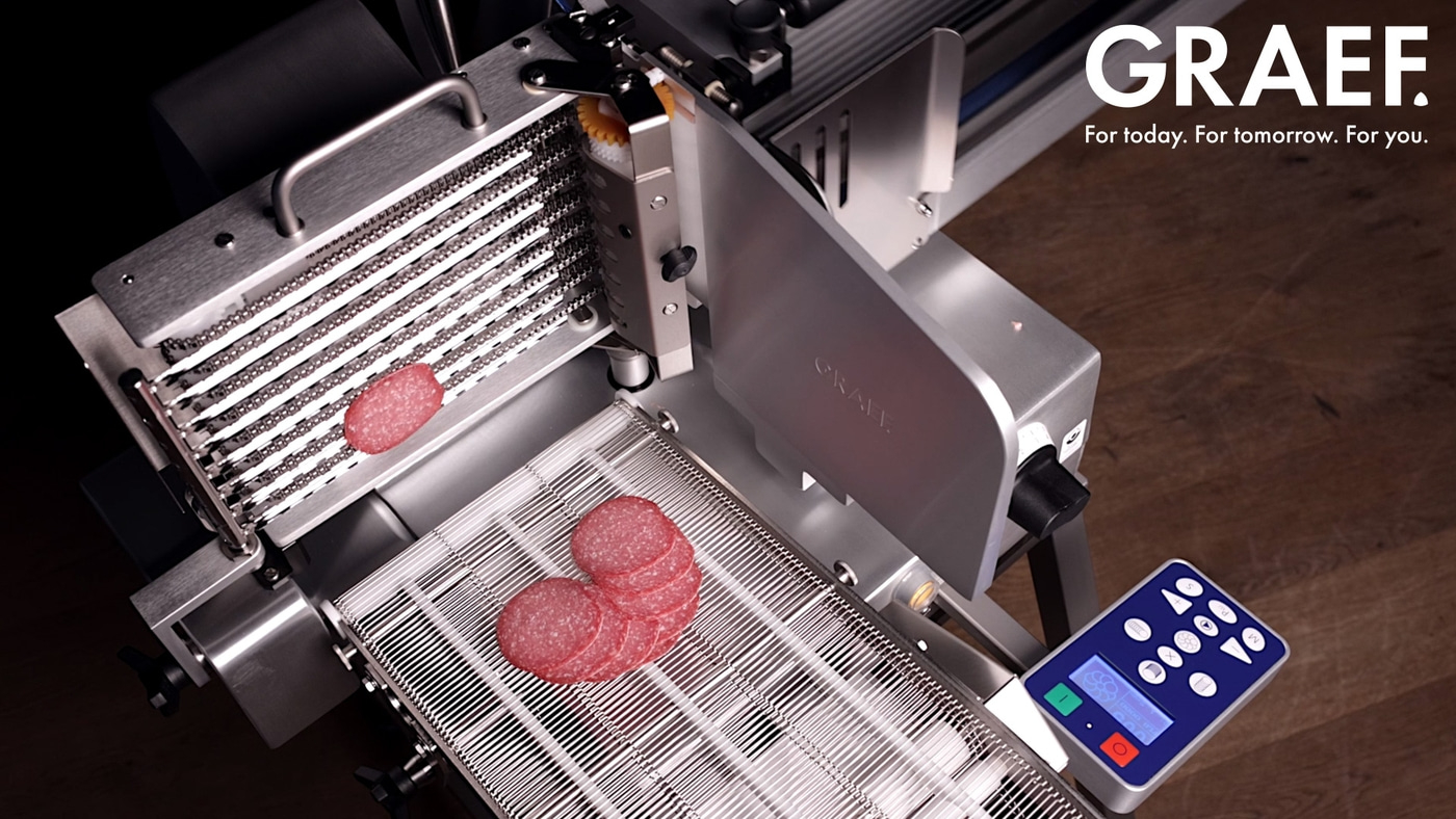 GRAEF slicer with salami slices, modern and efficient food preparation.