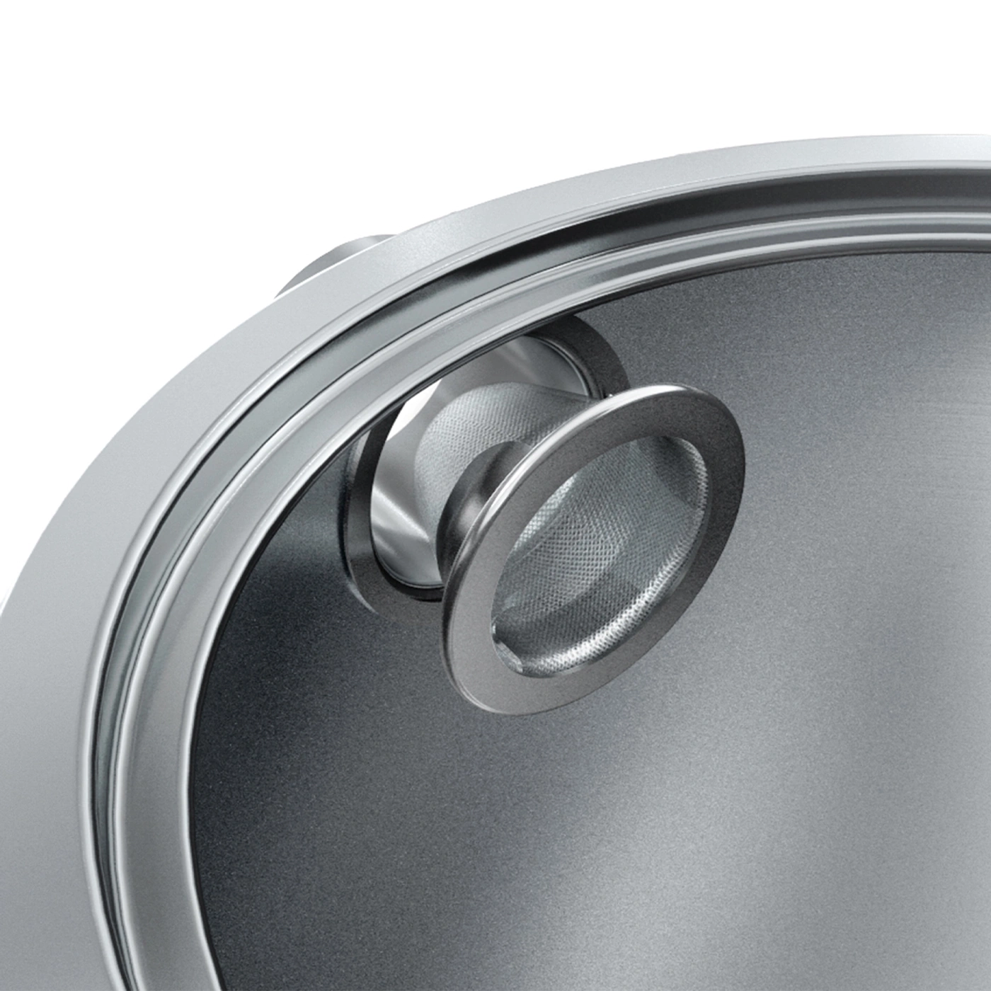 Close-up of a silver tea filter in a metal structure, detailed shot