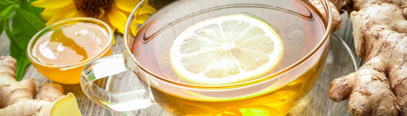 Cup of tea with lemon, honey, and ginger, healthy drink, close-up shot