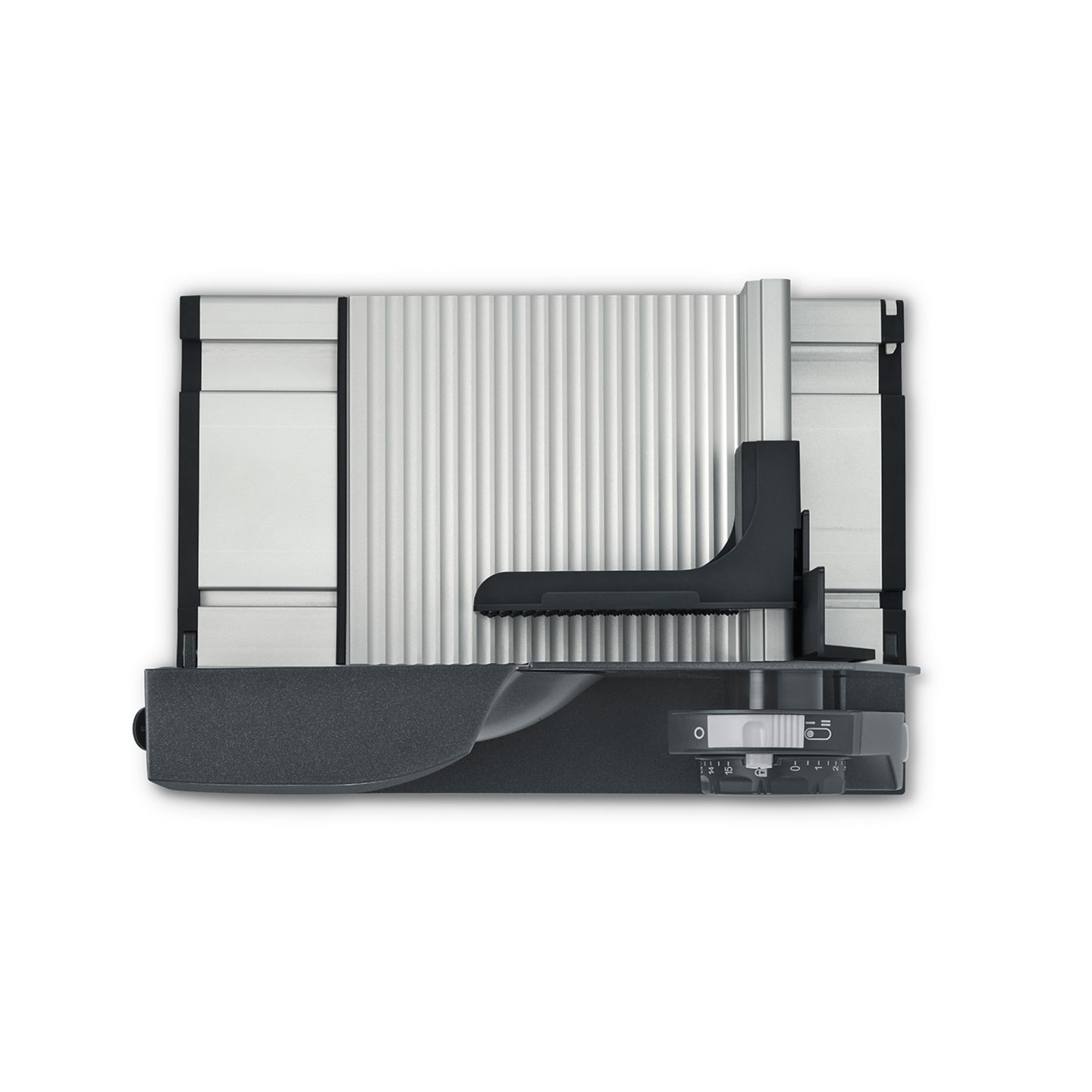 Close-up of a gray cutting device with a ridged surface and a black handle