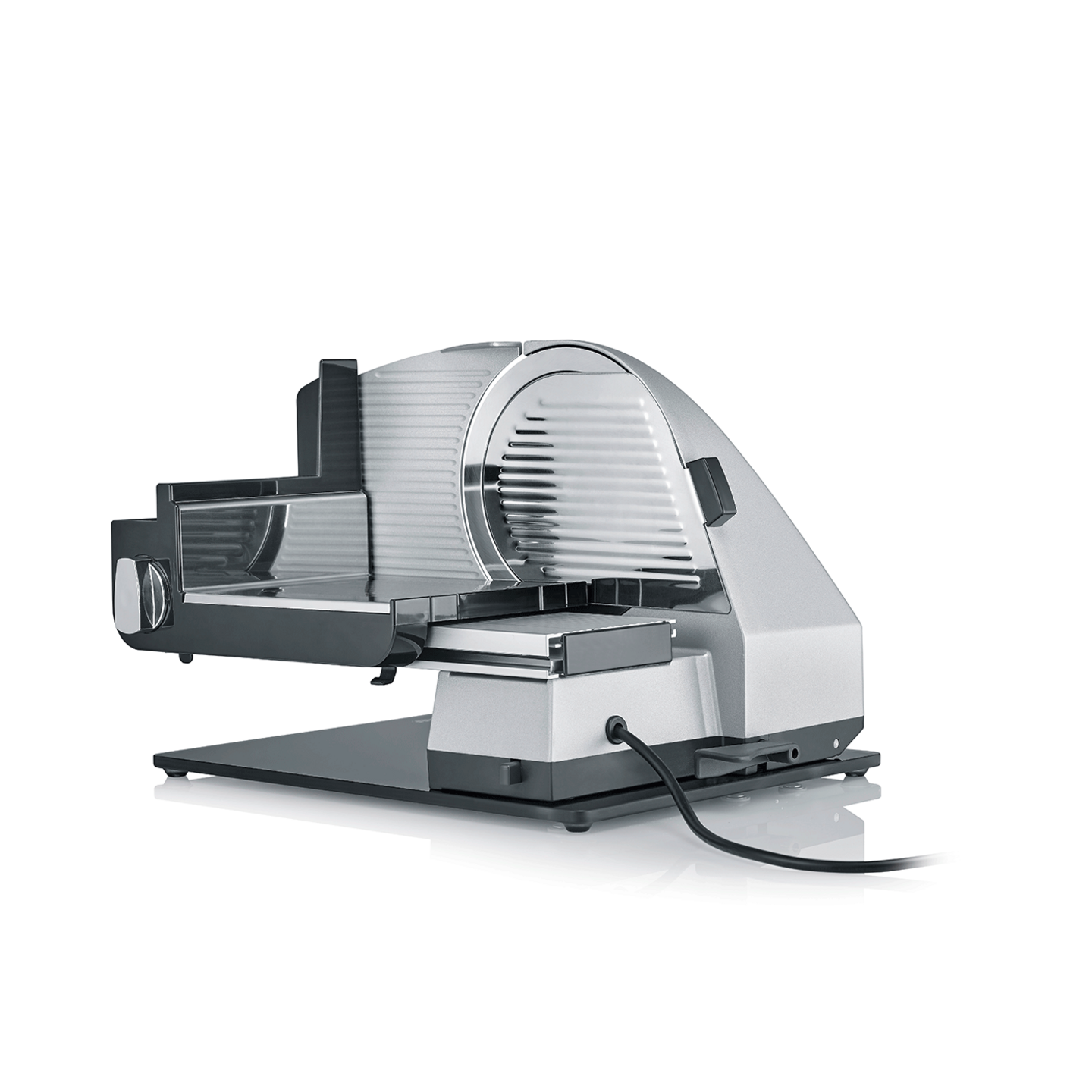 Electric food slicer, silver and black, isolated on white background, kitchen appliance.