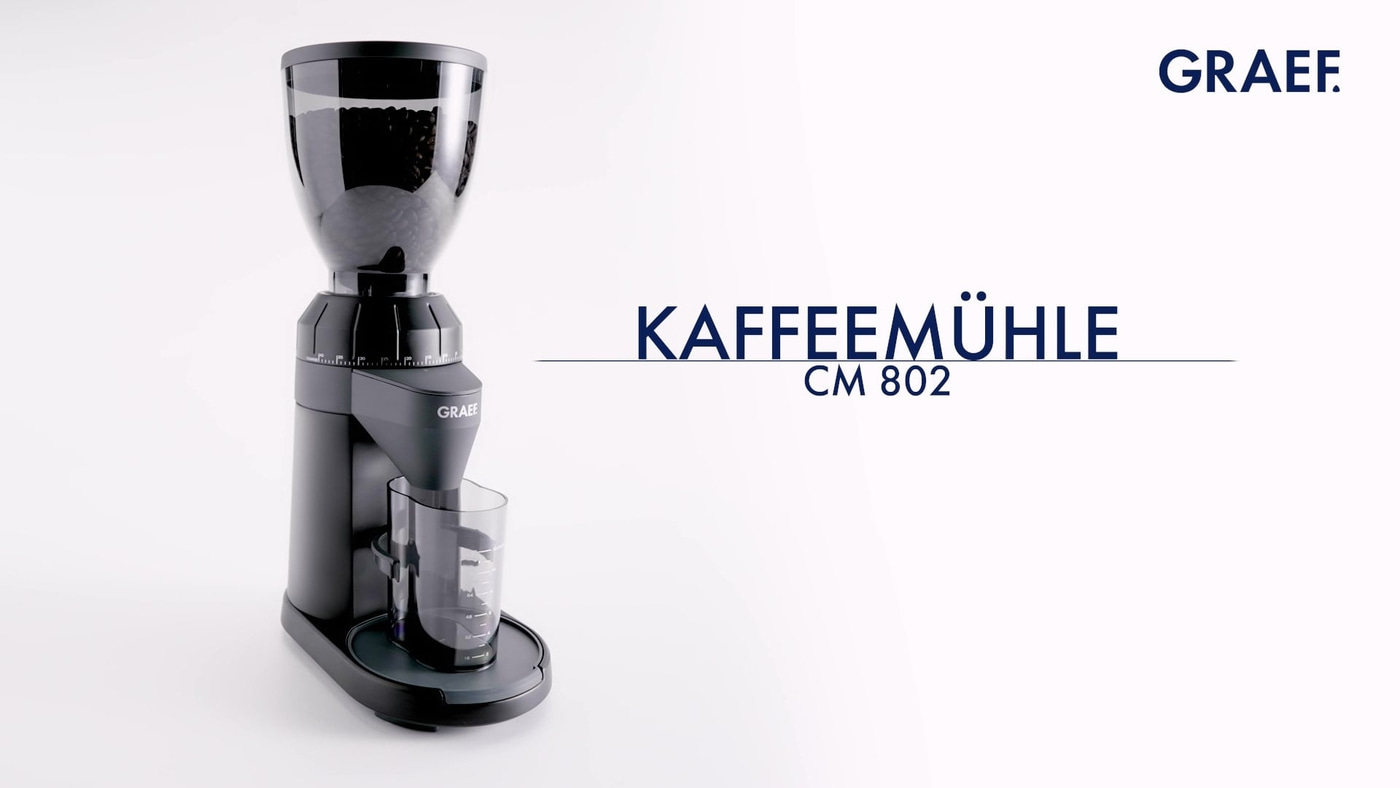 GRAEF CM 802 coffee grinder, black appliance, bean container, grinder, cup, white background