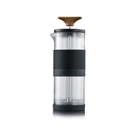 Coffee press with wooden handle and black band, glass container