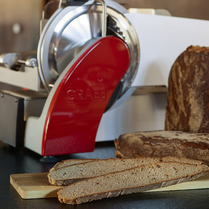 Sliced bread, bread slicer, wooden board, close-up shot, food, kitchen