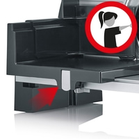 Food slicer with red arrow and warning symbol for safety instructions