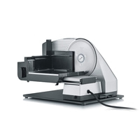 Silver Graef food slicer with black housing and power cord isolated on white background