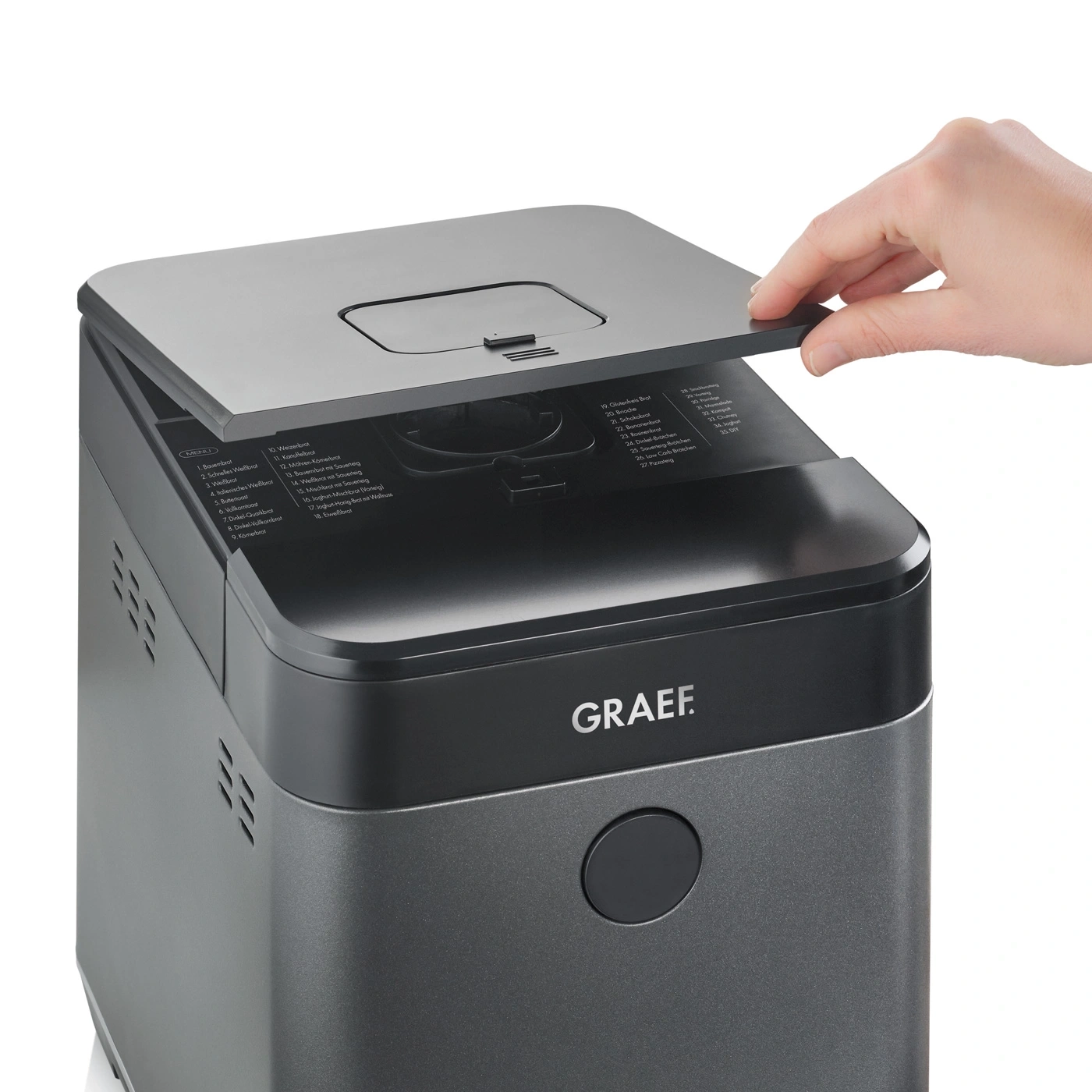 Graef bread maker with open lid and menu selection, close-up.