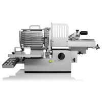 Silver commercial food slicer with control panel and blade, used for slicing food products.