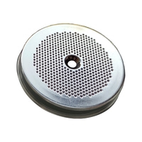 Metal filter with many small holes and a hole in the middle