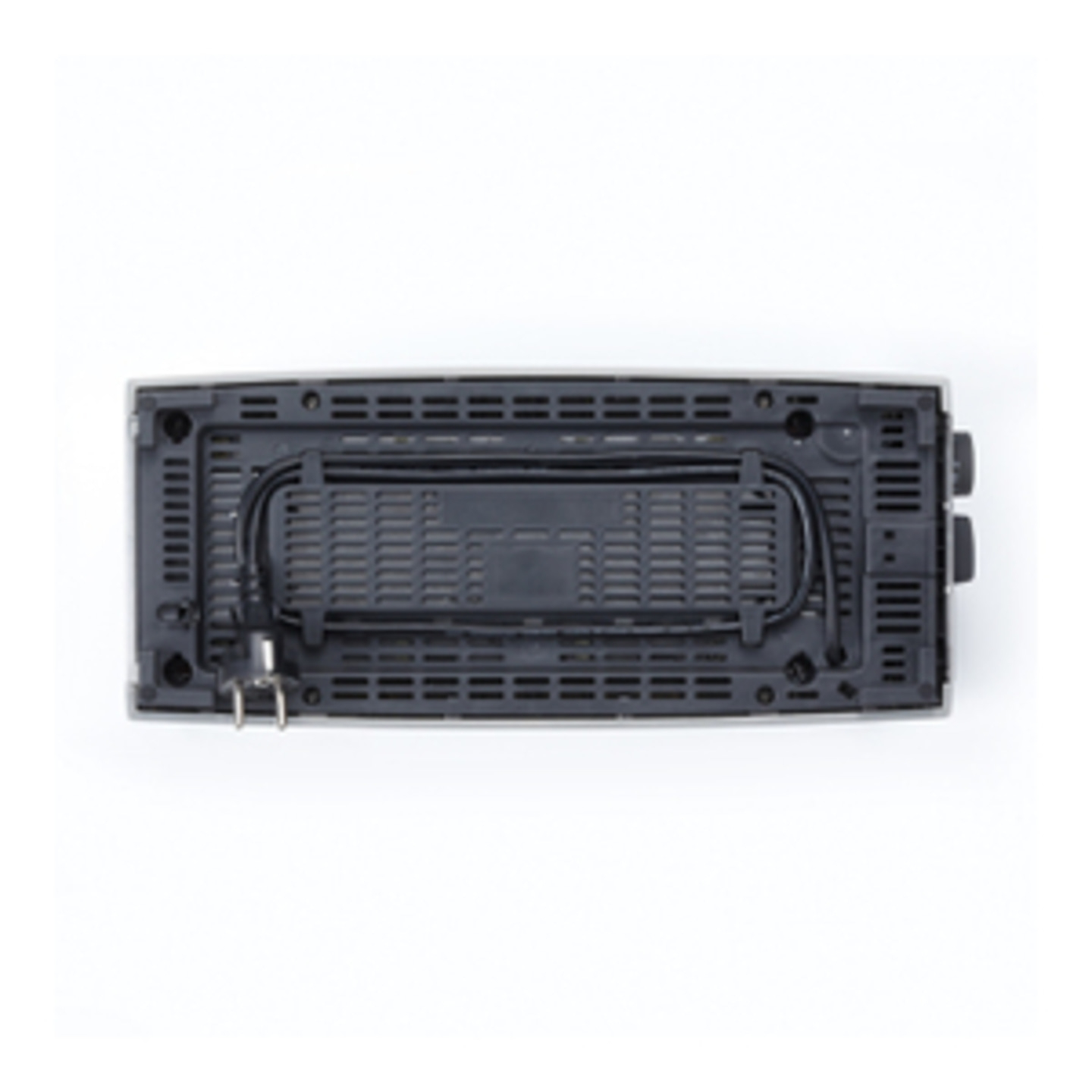 Top view of a black electronic device with holes and buttons.