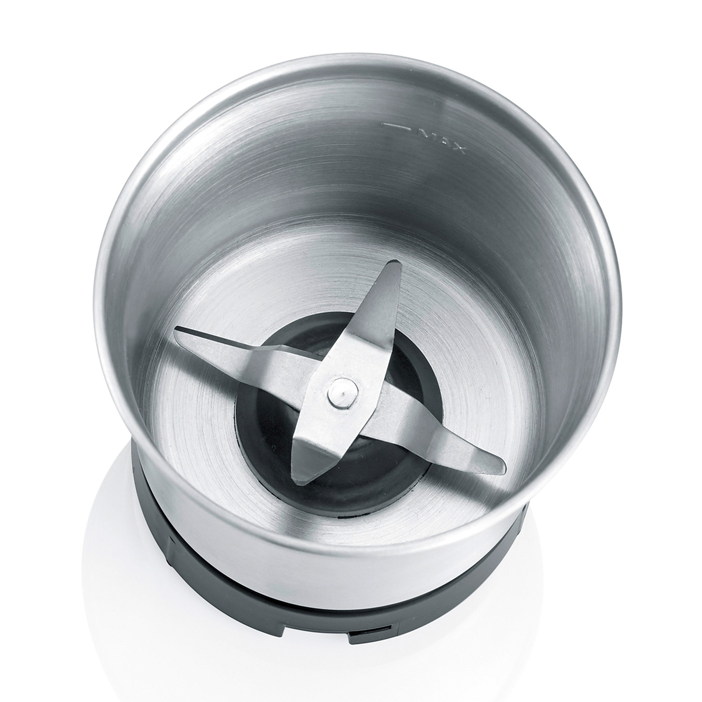 Coffee grinder from above. Stainless steel container with blades and black base.