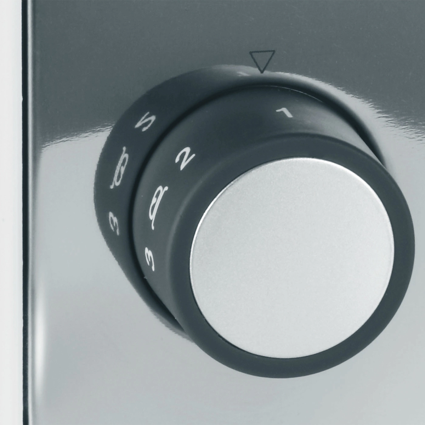 Rotary knob with numbers and a triangle indicating the current position.