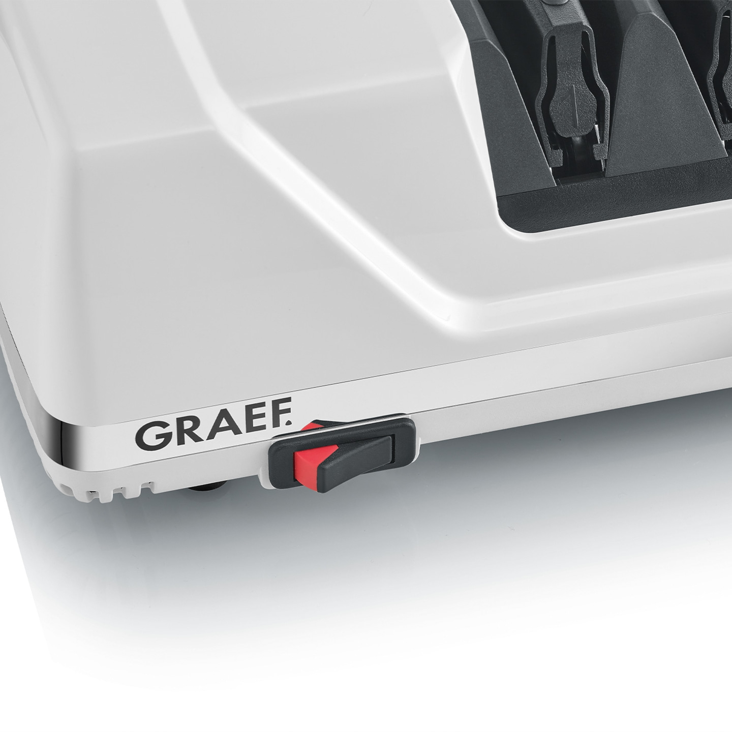 A white appliance with the GRAEF logo and a red/black switch.
