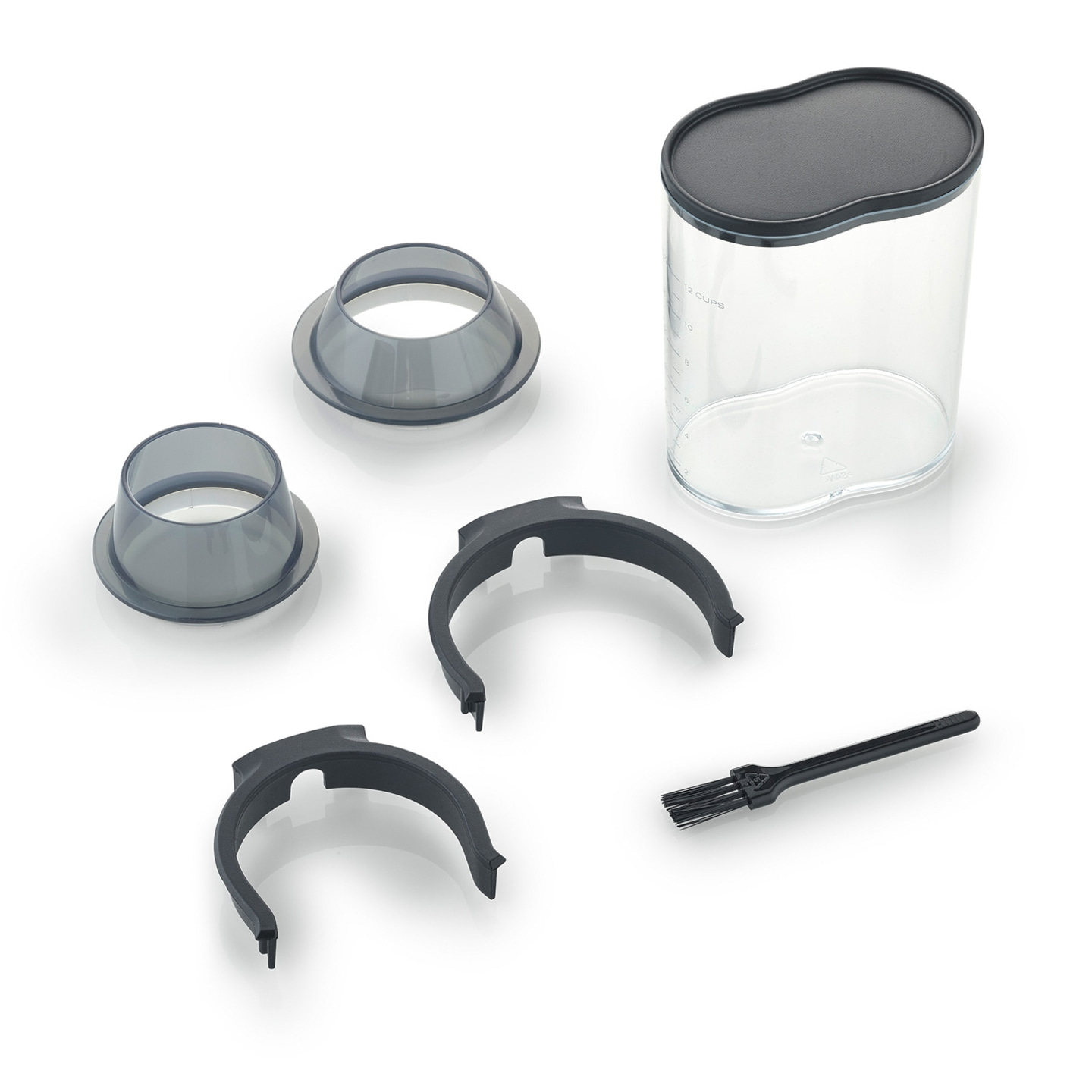 Disassembled kitchen machine with container, lid, brush, and accessories.