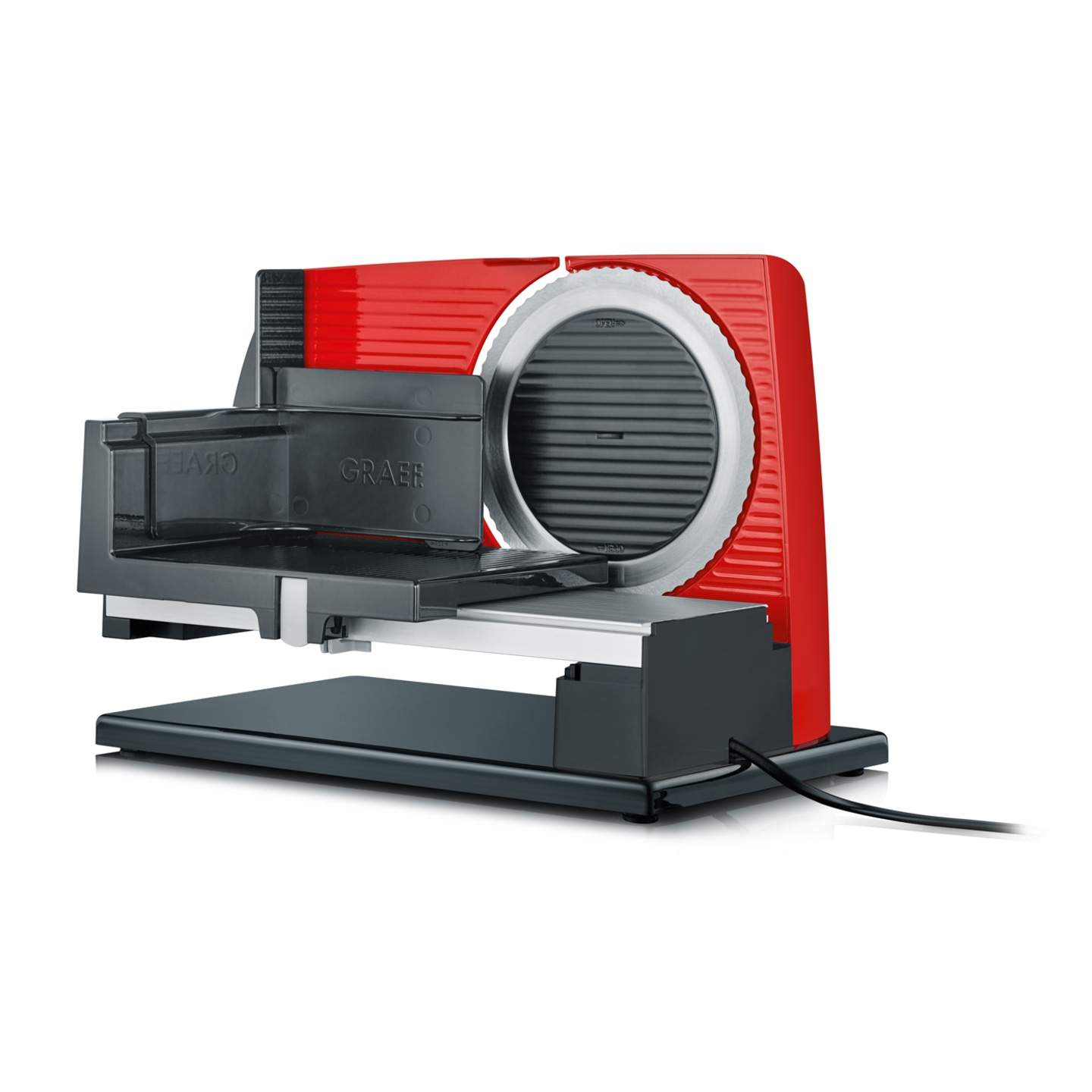 Red Graef slicer with metal blade and black carriage.