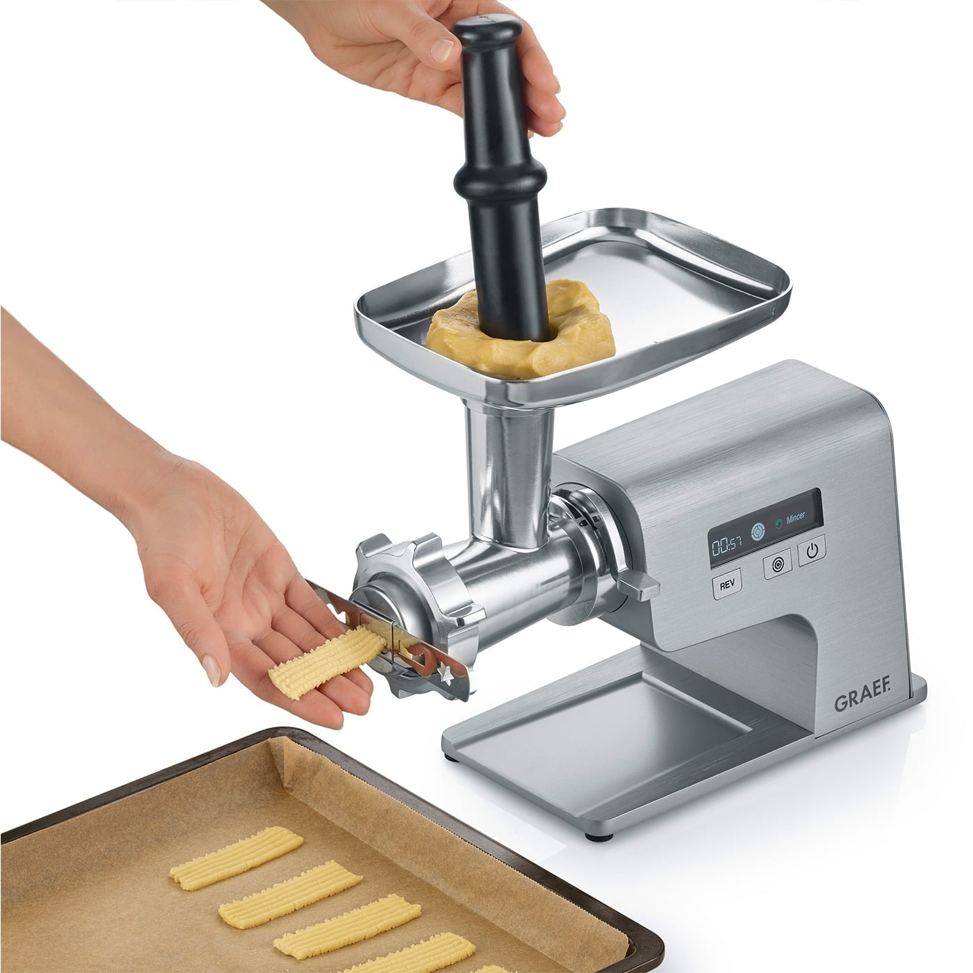 Meat grinder with dough, hands, baking sheet, GRAEF, kitchen, food, cooking
