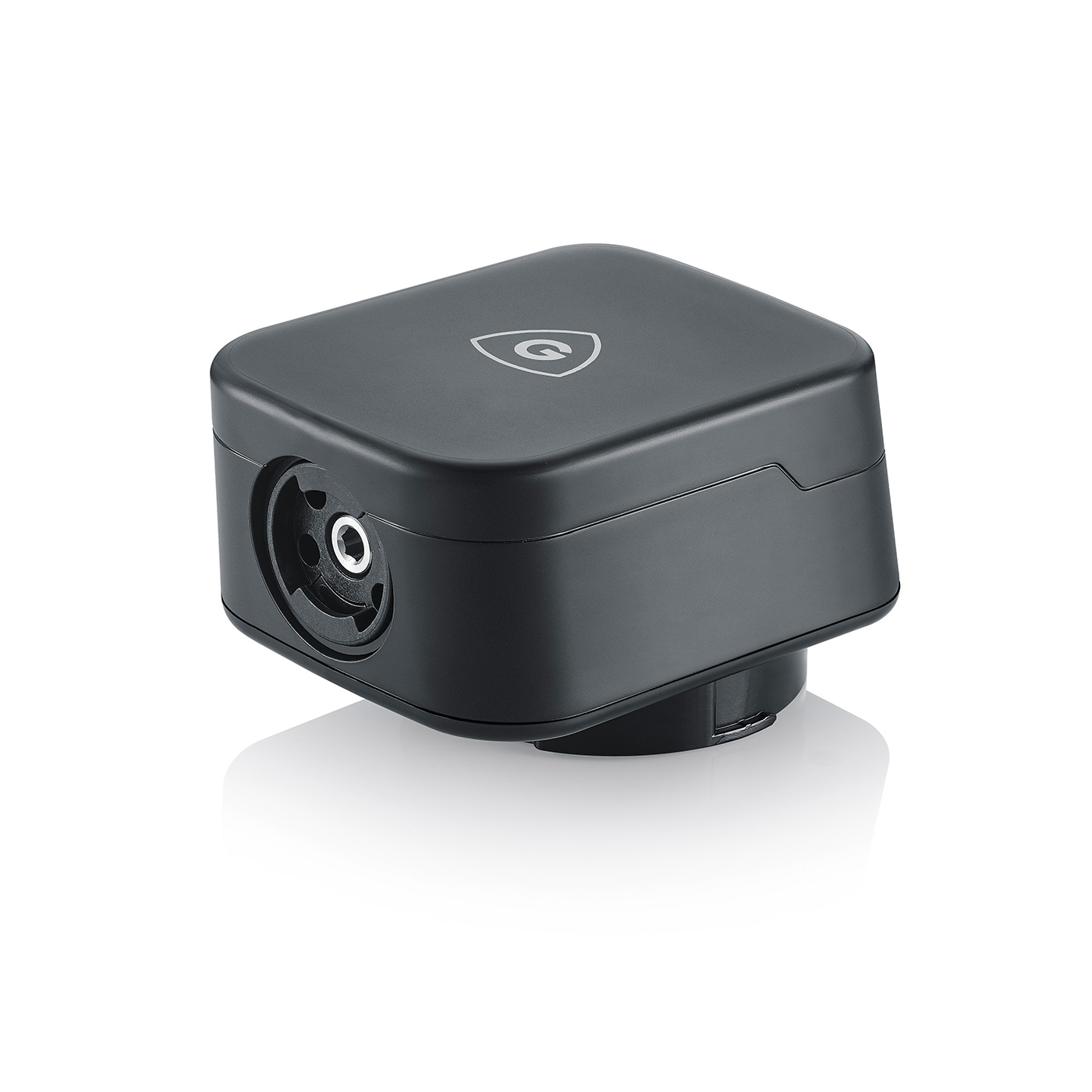 Dispositivo elettronico nero con un foro e un logo sulla superficie superiore.