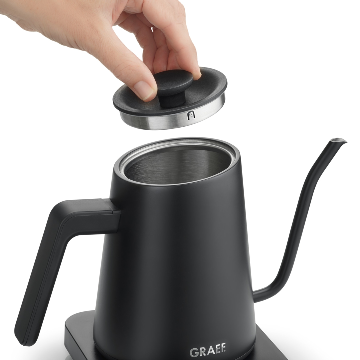 Black kettle with removable lid, hand holding lid, GRAEF logo visible