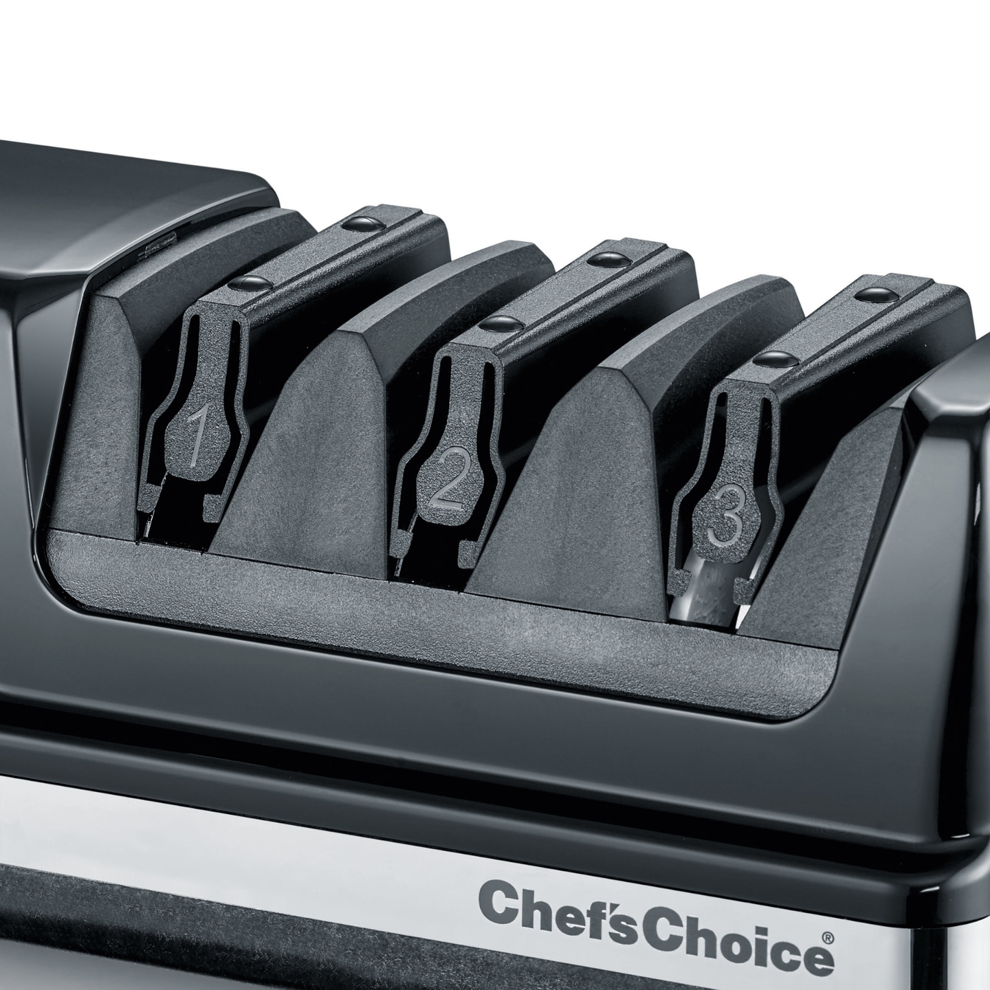 Black and silver Chef's Choice knife sharpener with three stages for sharpening.