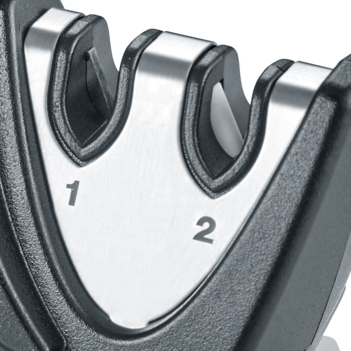 Affilacoltelli con due fessure, contrassegnato con i numeri 1 e 2.