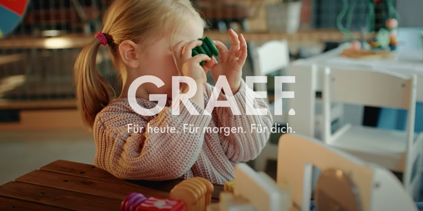 A child plays with toys. GRAEFF. For today. For tomorrow. For you.